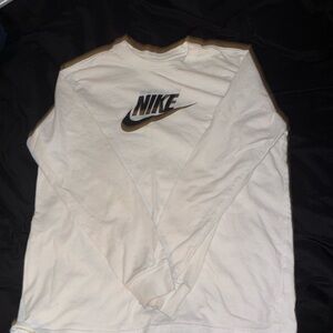 Nike. White. Big kids XL but can also fit as women’s M